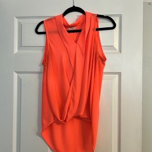 Lush high low sleeveless tank. Bright peach.